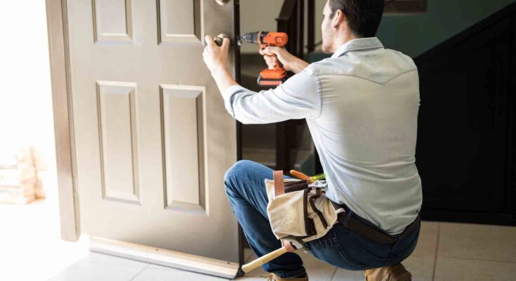 A door mechanic is Replacing Old Door